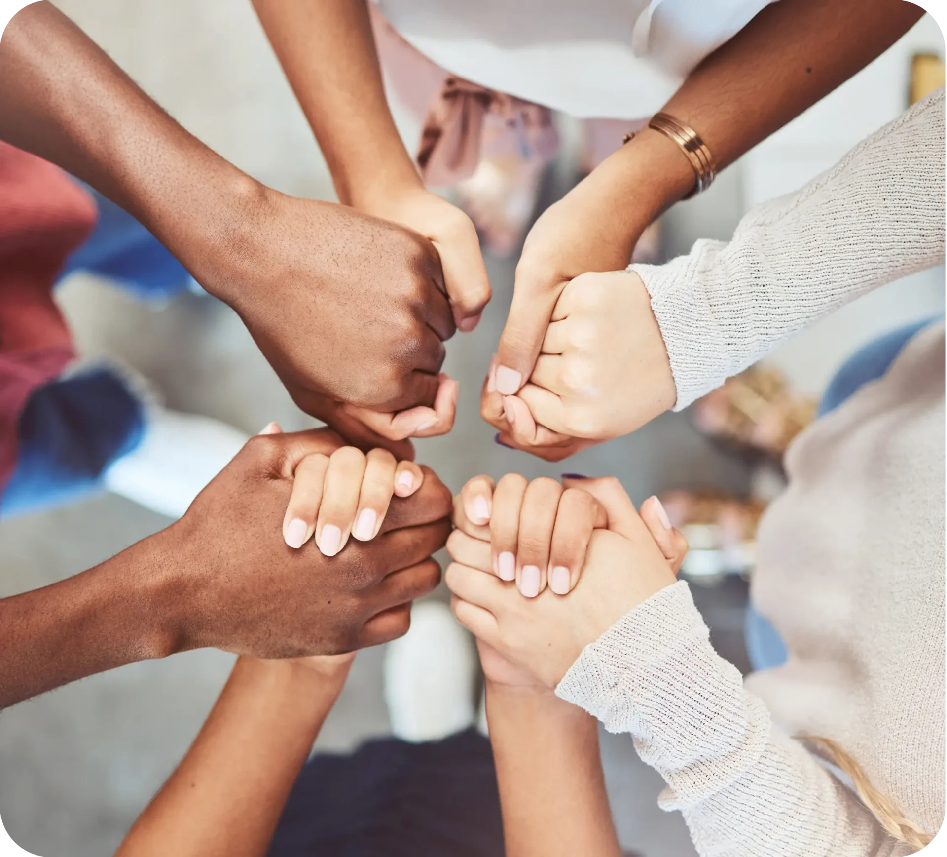 Diverse hands joined in unity