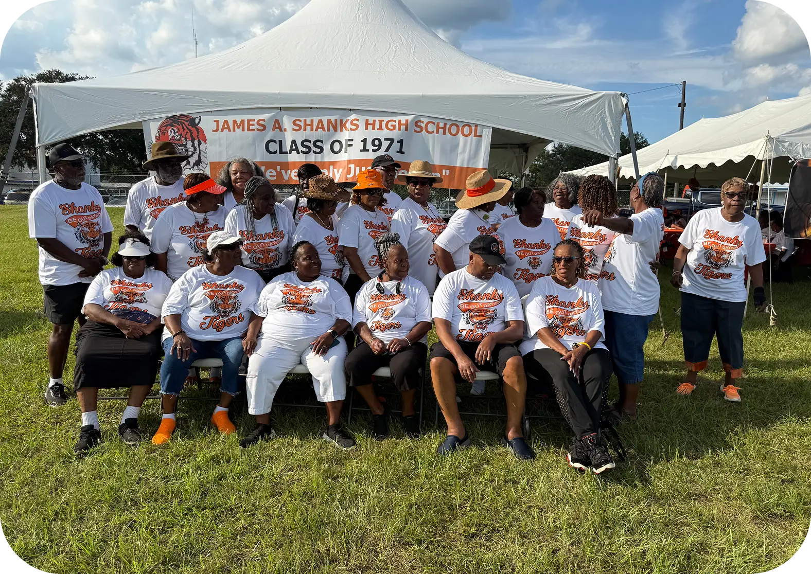 Alumni wearing matching reunion T-shirts